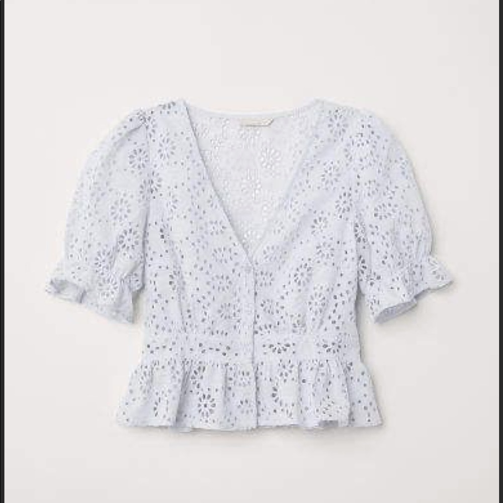 Blue blouse with eyelet embroidery
